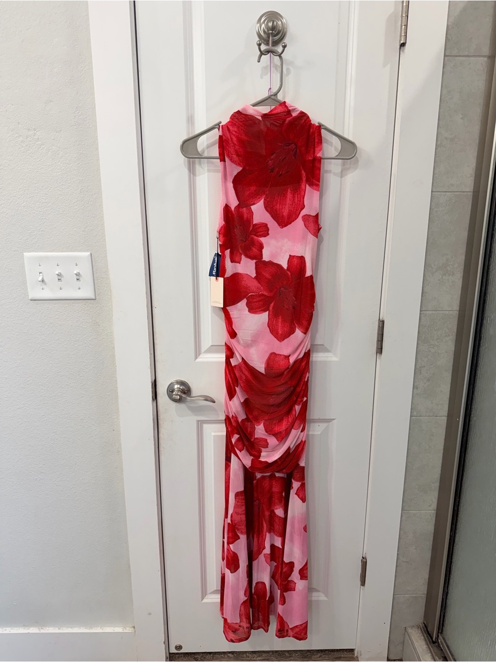 Sleeveless Pink Dress with Bold Red Floral Print